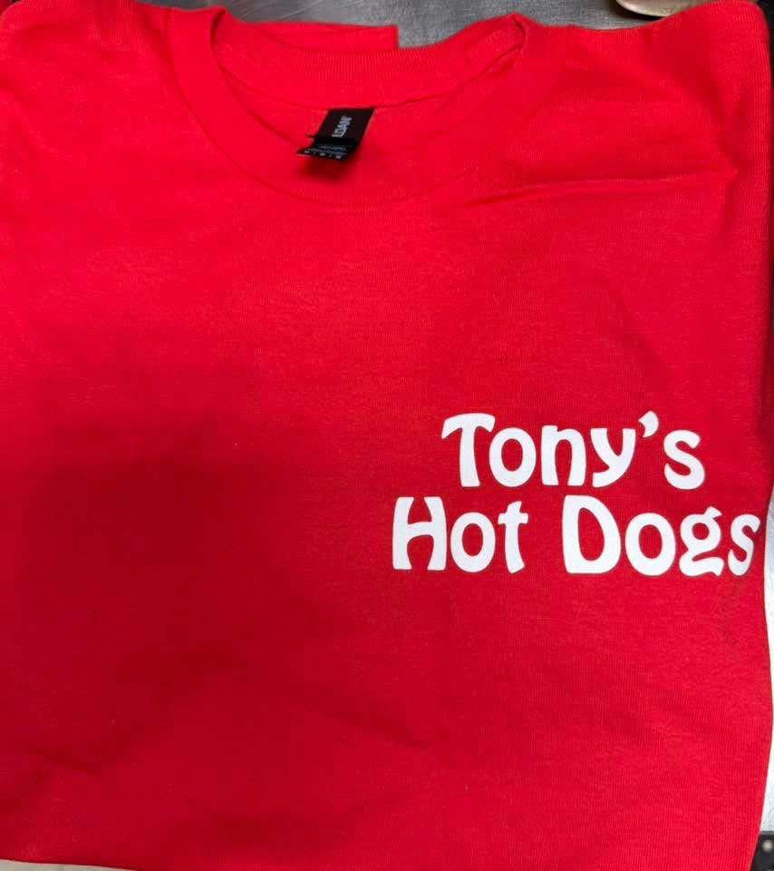 Front of red Tony's Hot Dogs t-shirt with white 'Tony's Hot Dogs' logo on the chest